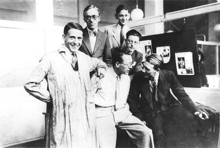 Edward (centre sitting on table) with the Lintas design and layout team at Unilever House in 1934.